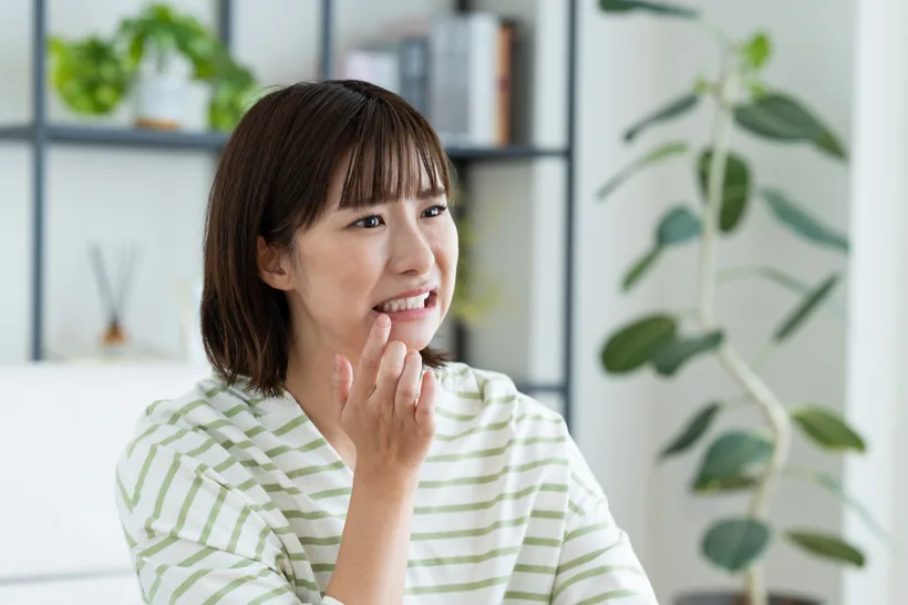 口元を気にする女性（イメージ）